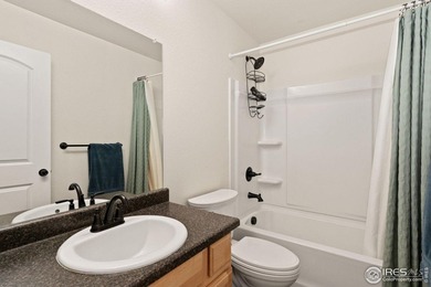 Fabulous ranch-style home with incredible mountain views backing on Raindance National Golf Course in Colorado - for sale on GolfHomes.com, golf home, golf lot