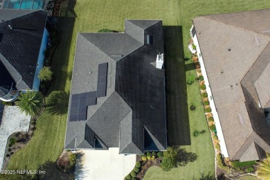 This luxury four bedroom, three bath upgraded home on a wooded on Amelia National Golf and Country Club in Florida - for sale on GolfHomes.com, golf home, golf lot