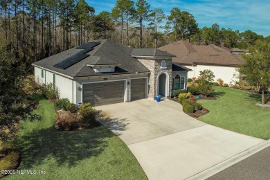 This luxury four bedroom, three bath upgraded home on a wooded on Amelia National Golf and Country Club in Florida - for sale on GolfHomes.com, golf home, golf lot