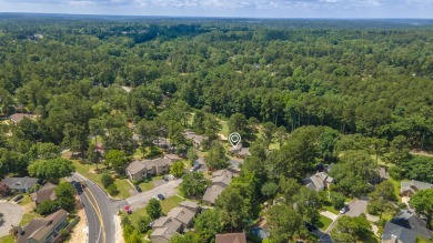 Welcome to this light and inviting 2-bed, 2 1/2 bath on Houndslake Country Club in South Carolina - for sale on GolfHomes.com, golf home, golf lot