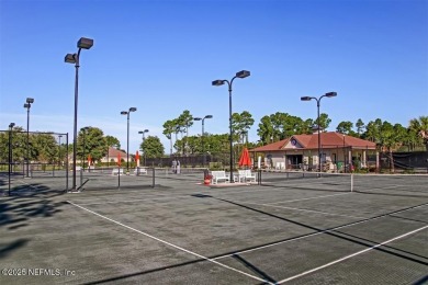 This luxury four bedroom, three bath upgraded home on a wooded on Amelia National Golf and Country Club in Florida - for sale on GolfHomes.com, golf home, golf lot