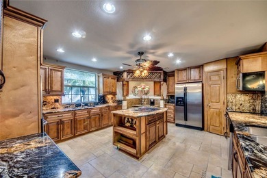 ONE and ONLY 4-SEASON INDOOR POOL IN SOLARIUM gallery. Spacious on Palmetto-Pine Country Club in Florida - for sale on GolfHomes.com, golf home, golf lot