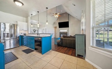 This charming 4-bedroom, 2-bath home in Patricia Island Country on Patricia Island Golf Club in Oklahoma - for sale on GolfHomes.com, golf home, golf lot