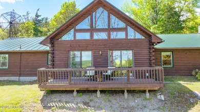 Spectacular log home offering! This immaculate 3-bed, 2.5-bath on Skene Valley Country Club in New York - for sale on GolfHomes.com, golf home, golf lot
