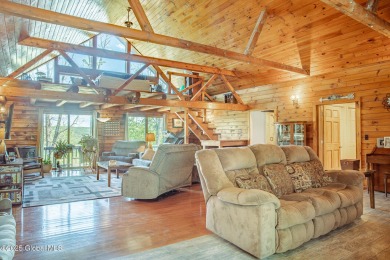 Spectacular log home offering! This immaculate 3-bed, 2.5-bath on Skene Valley Country Club in New York - for sale on GolfHomes.com, golf home, golf lot