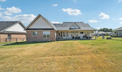 This charming 4-bedroom, 2-bath home in Patricia Island Country on Patricia Island Golf Club in Oklahoma - for sale on GolfHomes.com, golf home, golf lot