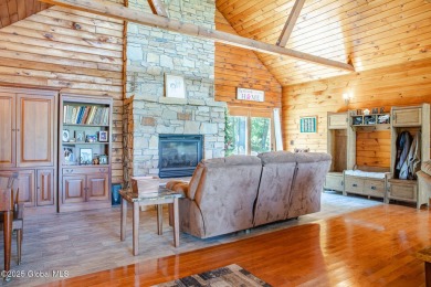 Spectacular log home offering! This immaculate 3-bed, 2.5-bath on Skene Valley Country Club in New York - for sale on GolfHomes.com, golf home, golf lot