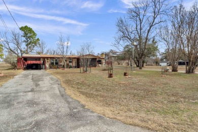 Lake view cottage with views of Packsaddle Mountain and loads of on Packsaddle Country Club in Texas - for sale on GolfHomes.com, golf home, golf lot