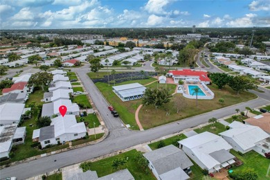 Adorable 2-bedroom, 2-bathroom home with a 1-car garage, ideally on Mainlands Golf Club in Florida - for sale on GolfHomes.com, golf home, golf lot