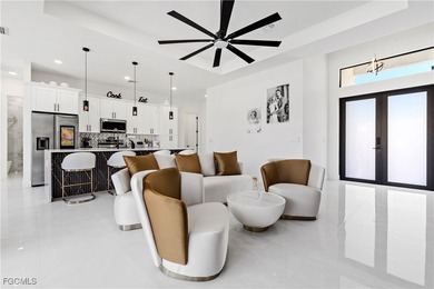 Discover refined Florida living in this exquisite 2024-built on Palmetto-Pine Country Club in Florida - for sale on GolfHomes.com, golf home, golf lot