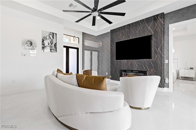 Discover refined Florida living in this exquisite 2024-built on Palmetto-Pine Country Club in Florida - for sale on GolfHomes.com, golf home, golf lot