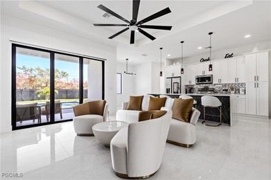 Discover refined Florida living in this exquisite 2024-built on Palmetto-Pine Country Club in Florida - for sale on GolfHomes.com, golf home, golf lot