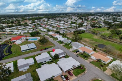 Adorable 2-bedroom, 2-bathroom home with a 1-car garage, ideally on Mainlands Golf Club in Florida - for sale on GolfHomes.com, golf home, golf lot