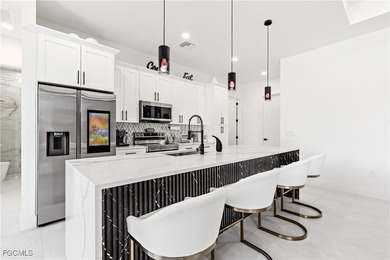 Discover refined Florida living in this exquisite 2024-built on Palmetto-Pine Country Club in Florida - for sale on GolfHomes.com, golf home, golf lot