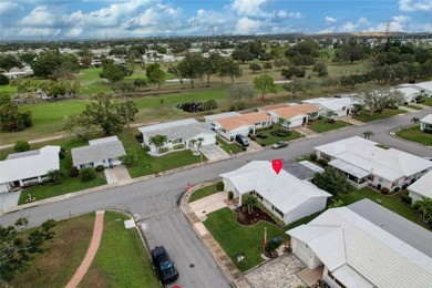 Adorable 2-bedroom, 2-bathroom home with a 1-car garage, ideally on Mainlands Golf Club in Florida - for sale on GolfHomes.com, golf home, golf lot