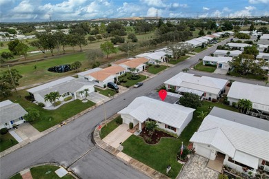 Adorable 2-bedroom, 2-bathroom home with a 1-car garage, ideally on Mainlands Golf Club in Florida - for sale on GolfHomes.com, golf home, golf lot