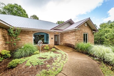 Welcome to your dream retreat! This stunning brick home with a for sale on GolfHomes.com