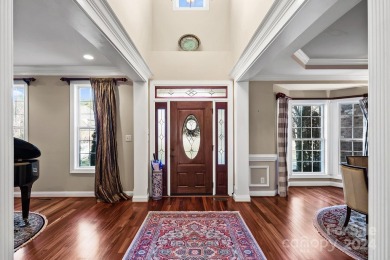 This elegant home boasts custom architectural amenities with on The Palisades Country Club in North Carolina - for sale on GolfHomes.com, golf home, golf lot