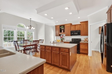 This warm and welcoming home sits in the heart of Wakefield on TPC at Wakefield Plantation in North Carolina - for sale on GolfHomes.com, golf home, golf lot