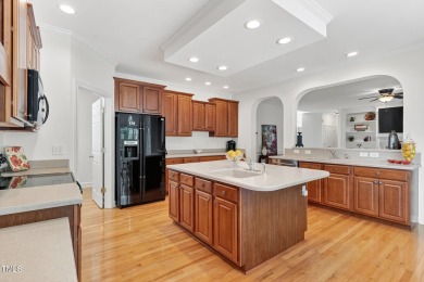 This warm and welcoming home sits in the heart of Wakefield on TPC at Wakefield Plantation in North Carolina - for sale on GolfHomes.com, golf home, golf lot