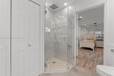 Stunningly renovated home in exclusive Delaire CC with 24-hour on Delaire Golf and Country Club in Florida - for sale on GolfHomes.com, golf home, golf lot