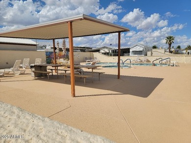 REDUCED!! YOU OWN THE LAND HERE!! This is a level lot with shed on 3 Parks Fairways in Arizona - for sale on GolfHomes.com, golf home, golf lot