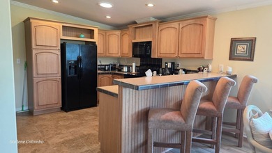 Don't Miss This Move-In Ready Home at 2677 Pier Drive, Ruskin on The Riverside Golf Club in Florida - for sale on GolfHomes.com, golf home, golf lot