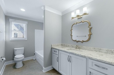 Welcome to Hampton Creek! This cozy Energy Right home is built on The Champions Club At Hampton Creek in Tennessee - for sale on GolfHomes.com, golf home, golf lot