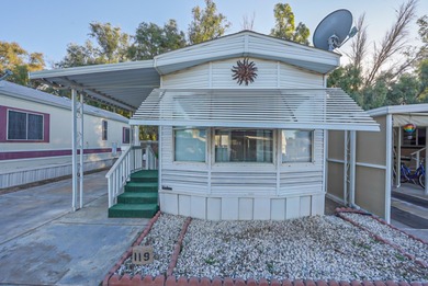 Motivated Seller! Discover a cozy 1-bedroom, 1-bathroom park on Ironwood Golf Course in Arizona - for sale on GolfHomes.com, golf home, golf lot