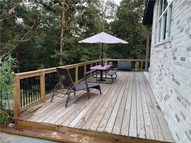 This beautifully maintained 4-bedroom, 2-bathroom home built was on Branchwood Golf Course in Arkansas - for sale on GolfHomes.com, golf home, golf lot
