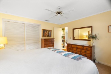 This beautifully maintained 3-bedroom, 2-bathroom pool home on Beacon Woods Golf Club in Florida - for sale on GolfHomes.com, golf home, golf lot