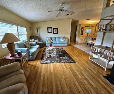 This home is located on leased land in a 55+ resort-style MH on Big Cypress Golf and Country Club in Florida - for sale on GolfHomes.com, golf home, golf lot