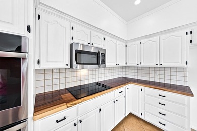 Nestled among mature trees in the Oaks of Riverhill, this on Riverhill Country Club in Texas - for sale on GolfHomes.com, golf home, golf lot