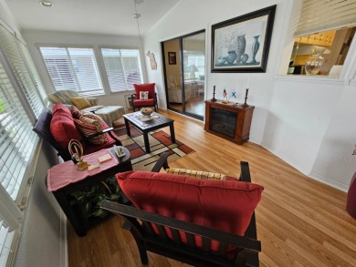 This home is located on leased land in a 55+ resort-style MH on Big Cypress Golf and Country Club in Florida - for sale on GolfHomes.com, golf home, golf lot