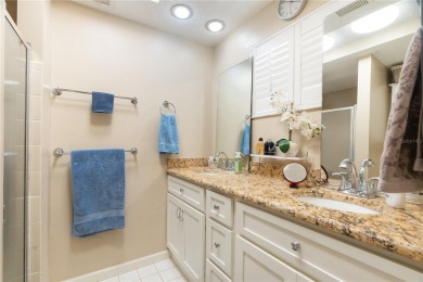 This beautifully maintained 3-bedroom, 2-bathroom pool home on Beacon Woods Golf Club in Florida - for sale on GolfHomes.com, golf home, golf lot