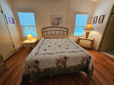 This home is located on leased land in a 55+ resort-style MH on Big Cypress Golf and Country Club in Florida - for sale on GolfHomes.com, golf home, golf lot