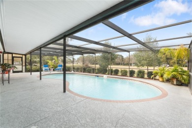 This beautifully maintained 3-bedroom, 2-bathroom pool home on Beacon Woods Golf Club in Florida - for sale on GolfHomes.com, golf home, golf lot