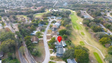 This beautifully maintained 3-bedroom, 2-bathroom pool home on Beacon Woods Golf Club in Florida - for sale on GolfHomes.com, golf home, golf lot