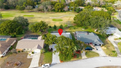 This beautifully maintained 3-bedroom, 2-bathroom pool home on Beacon Woods Golf Club in Florida - for sale on GolfHomes.com, golf home, golf lot