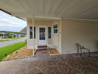 This home is located on leased land in a 55+ resort-style MH on Big Cypress Golf and Country Club in Florida - for sale on GolfHomes.com, golf home, golf lot