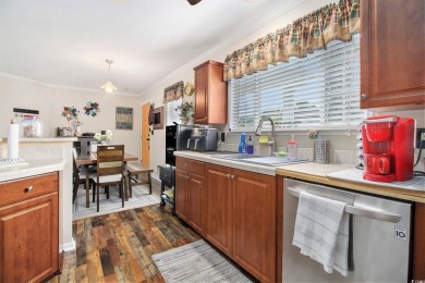Welcome Home! This beautifully maintained 2-bedroom, 2-bathroom on Burning Ridge Golf Course in South Carolina - for sale on GolfHomes.com, golf home, golf lot