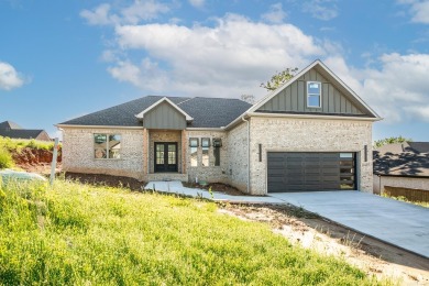 Welcome to this exquisite new construction home in Greystone on Greystone Country Club in Arkansas - for sale on GolfHomes.com, golf home, golf lot