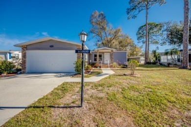 If you're looking for a home with a breathtaking view, this is on Pine Lakes Country Club in Florida - for sale on GolfHomes.com, golf home, golf lot