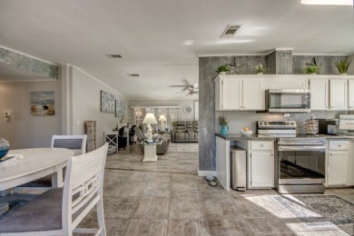 If you're looking for a home with a breathtaking view, this is on Pine Lakes Country Club in Florida - for sale on GolfHomes.com, golf home, golf lot