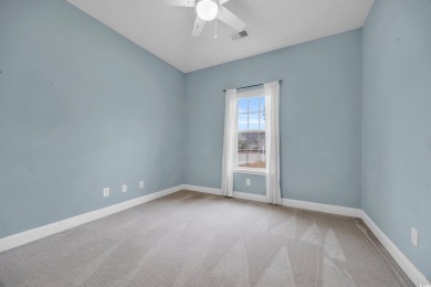 Located on a cul-de-sac in The Commons, this 3-bedroom on Burning Ridge Golf Course in South Carolina - for sale on GolfHomes.com, golf home, golf lot
