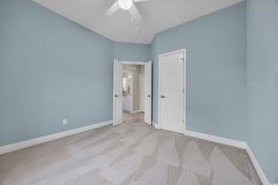 Located on a cul-de-sac in The Commons, this 3-bedroom on Burning Ridge Golf Course in South Carolina - for sale on GolfHomes.com, golf home, golf lot