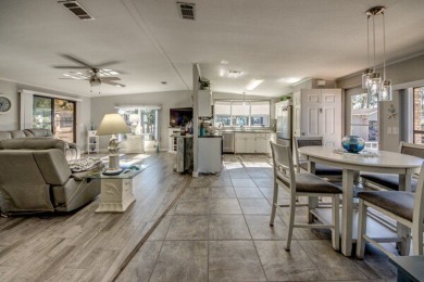 If you're looking for a home with a breathtaking view, this is on Pine Lakes Country Club in Florida - for sale on GolfHomes.com, golf home, golf lot