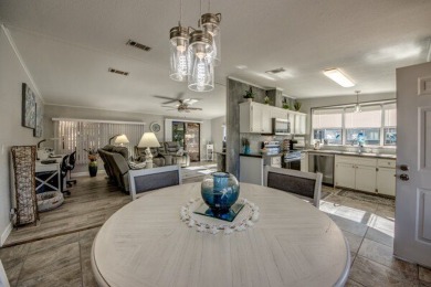 If you're looking for a home with a breathtaking view, this is on Pine Lakes Country Club in Florida - for sale on GolfHomes.com, golf home, golf lot
