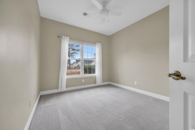 Located on a cul-de-sac in The Commons, this 3-bedroom on Burning Ridge Golf Course in South Carolina - for sale on GolfHomes.com, golf home, golf lot