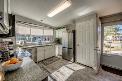 If you're looking for a home with a breathtaking view, this is on Pine Lakes Country Club in Florida - for sale on GolfHomes.com, golf home, golf lot